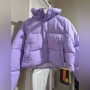 Purple Jacket with Yellow Tag
